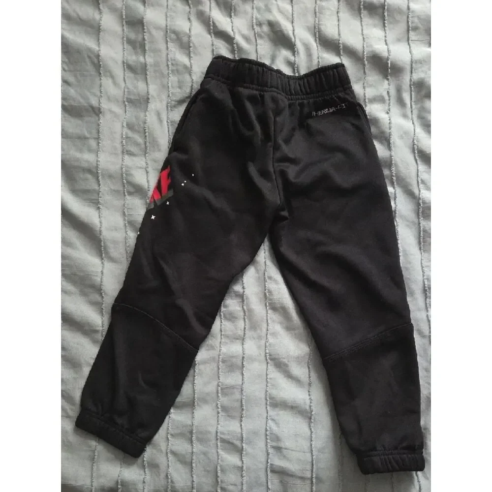 Nike Kids Black Sweatpants with Pink Logo